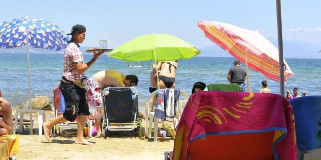 n-beach-greece-tourists-628x314