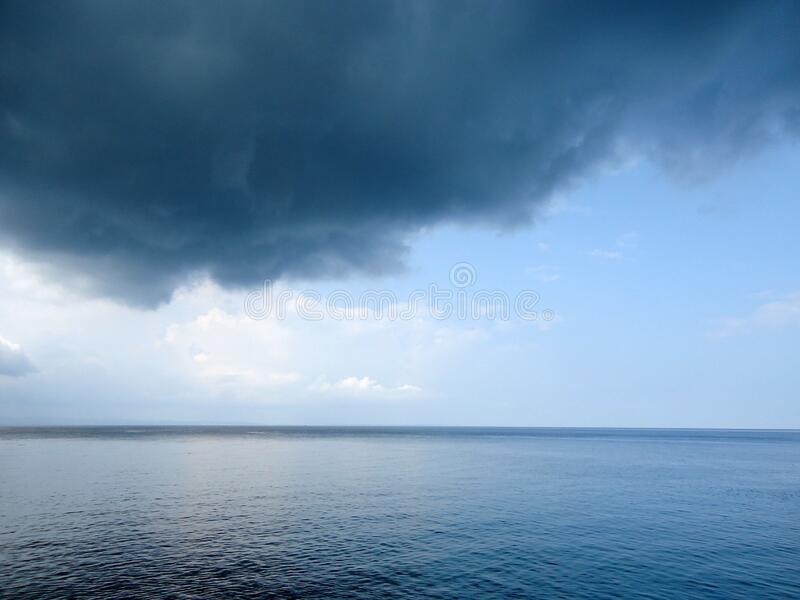 cloudy-summer-day-sea-sithonia-greece-dark-cloud-dark-blue-sea-sea-storm-cloudy-summer-day-sea-170086231